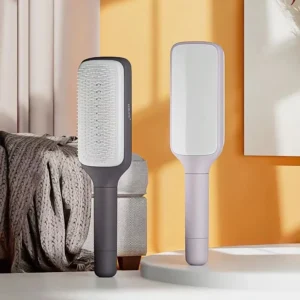4-in-1 self-cleaning styling comb